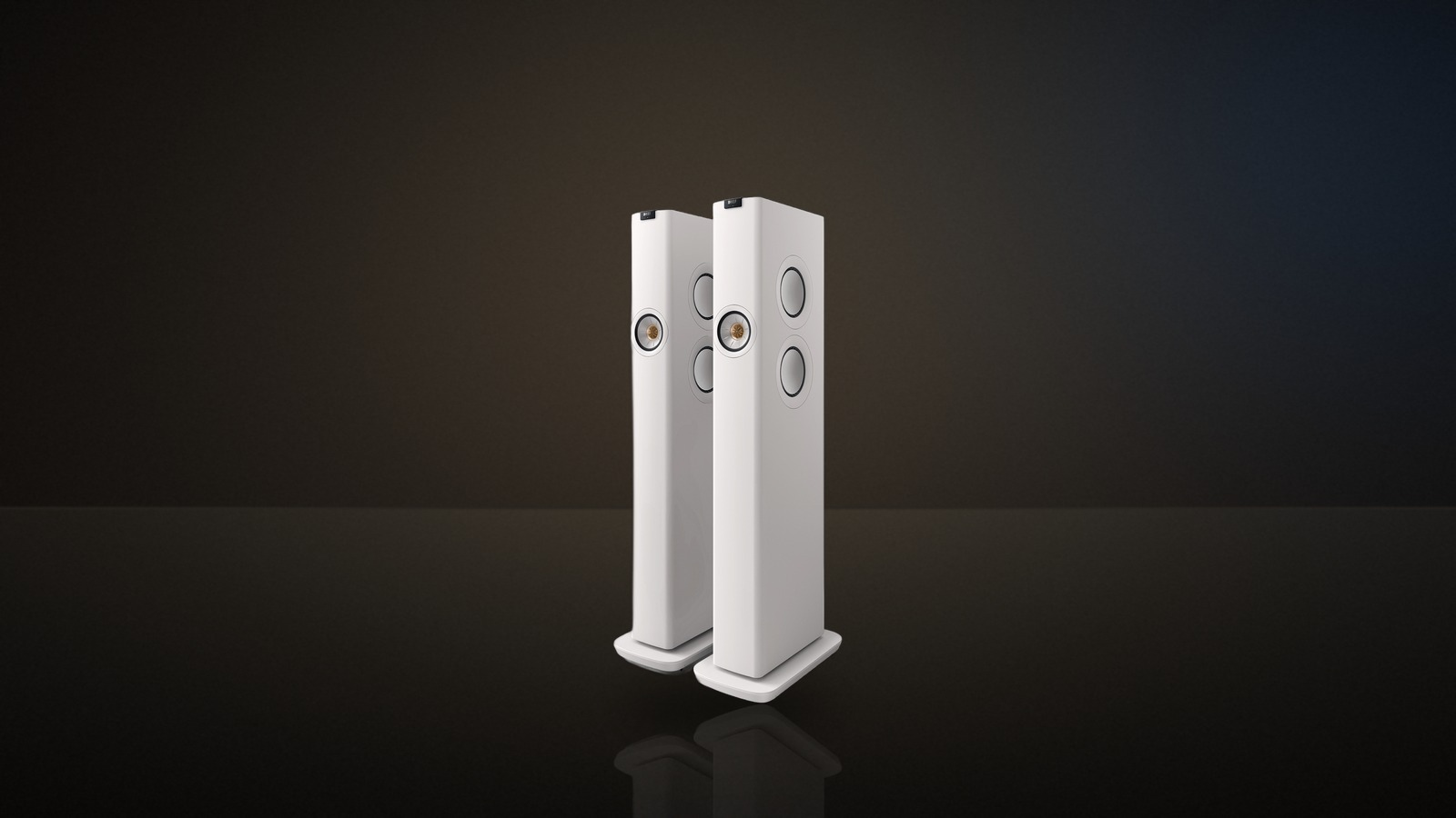 KEF LS60 Wireless em composição editorial do Guia do Áudio a partir da foto real do produto