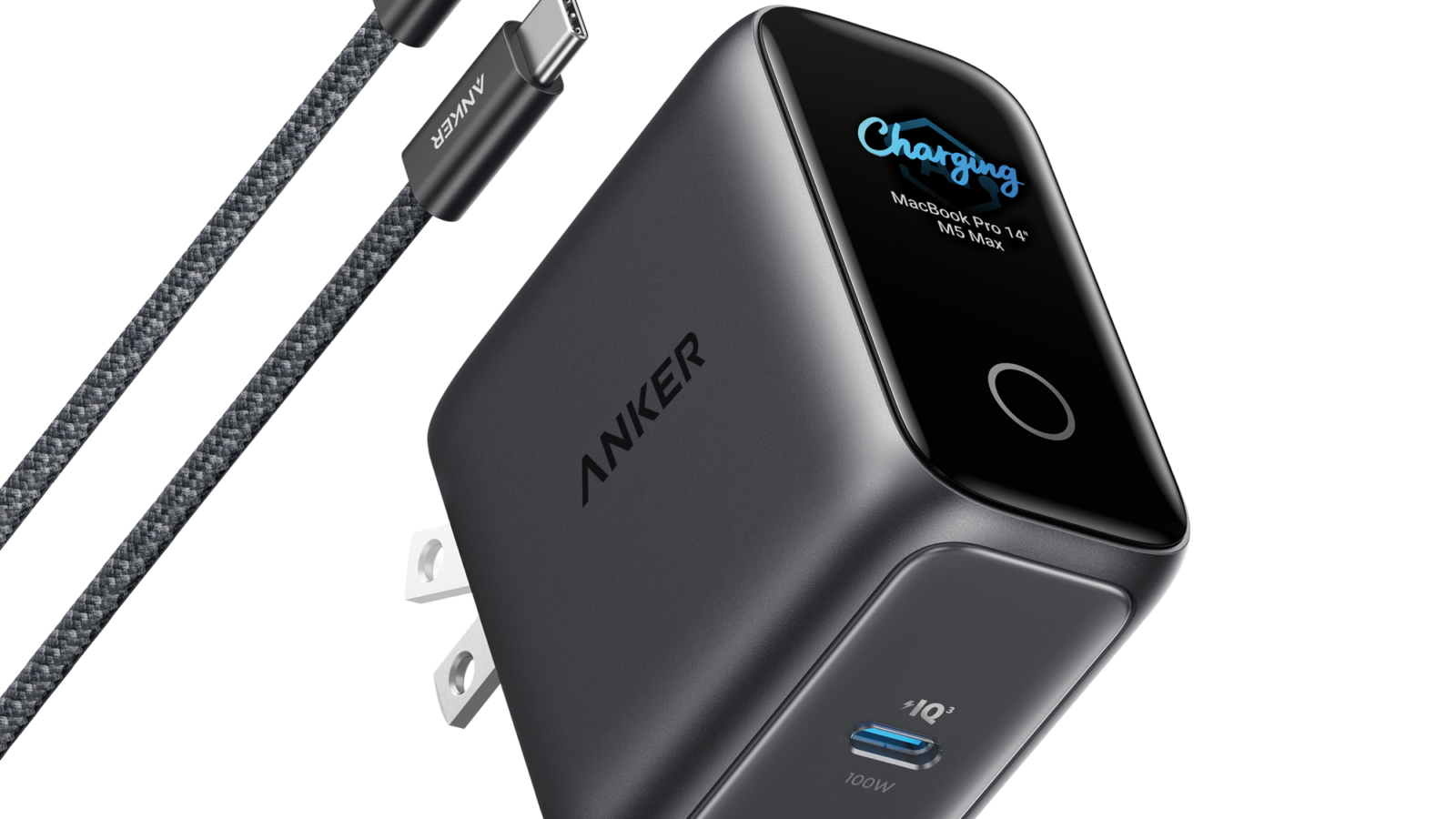 Carregador Anker Laptop Charger Pro de 100 W, cinza, com uma porta USB-C e tela colorida na frente mostrando a potência de carga