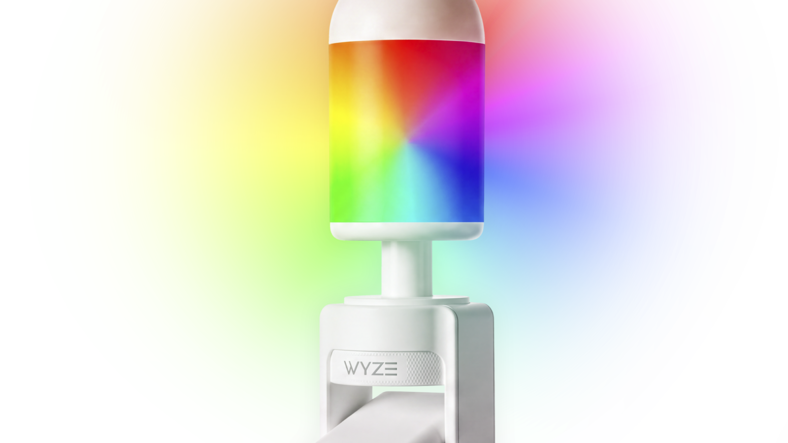 Wyze Bulb Cam Pan Color branca, com lâmpada acesa em cores do arco-íris no topo e câmera de segurança giratória embaixo