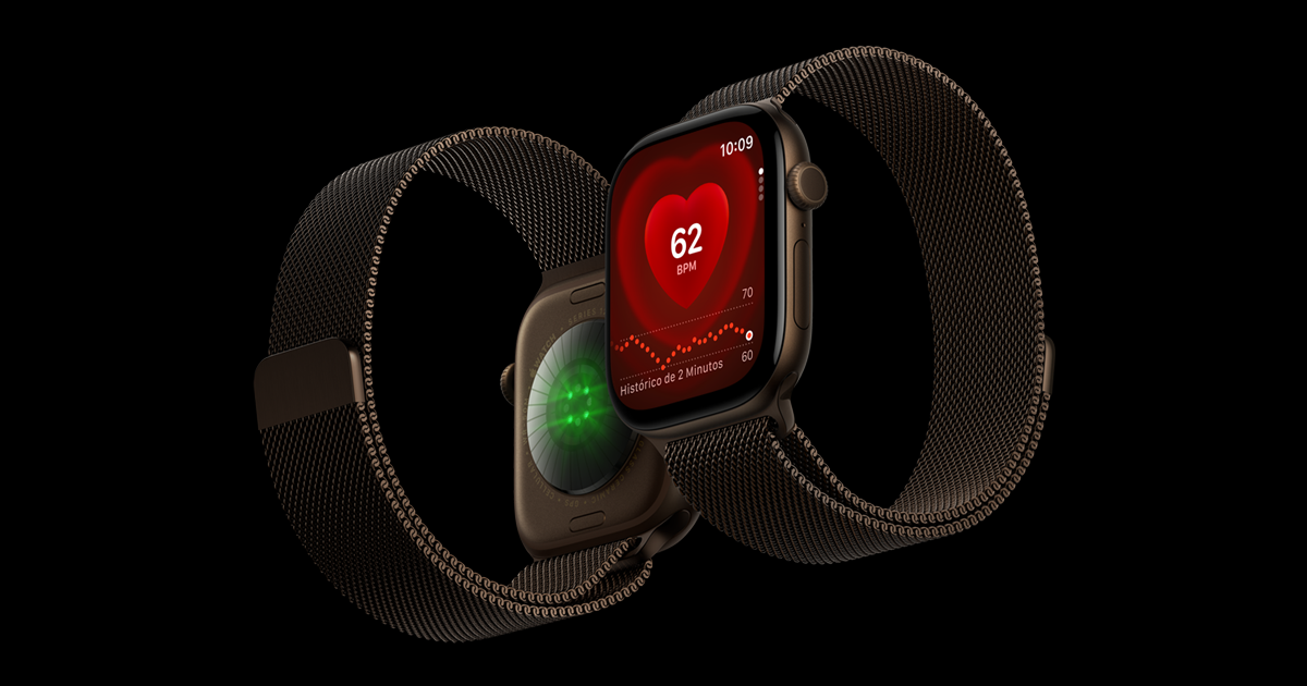 "Apple Watch Series 12 com pulseira de metal escura em fundo preto, tela mostrando o app de frequência cardíaca"