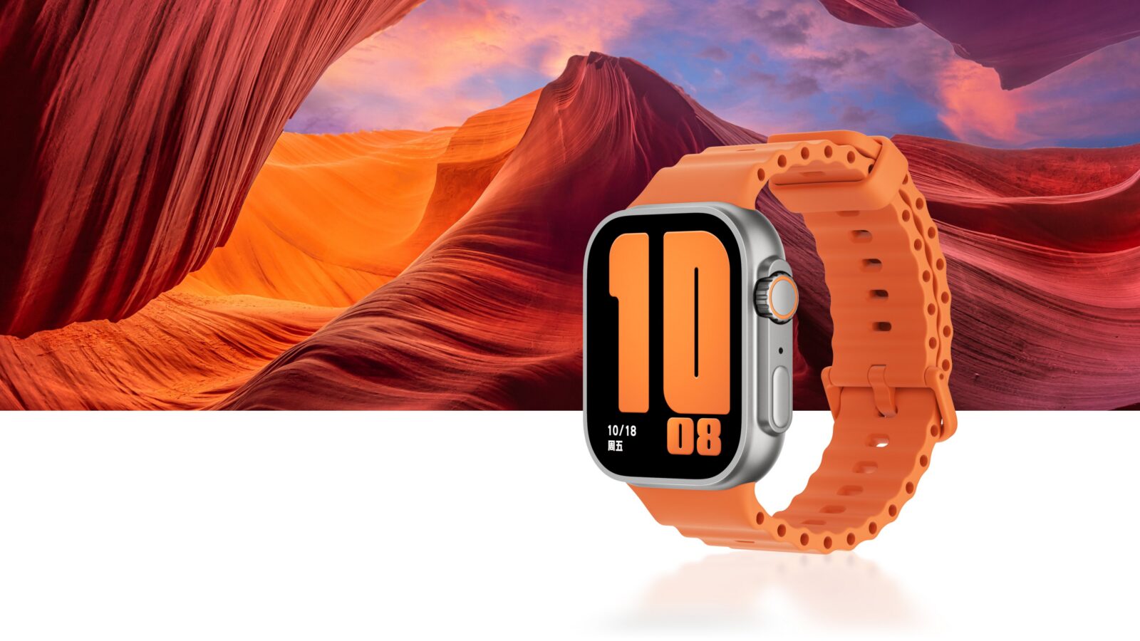Smartwatch Honor Watch Fit 6 na cor laranja, com caixa de metal prateada, coroa digital e pulseira de silicone laranja, diante de um cânion de pedra avermelhada